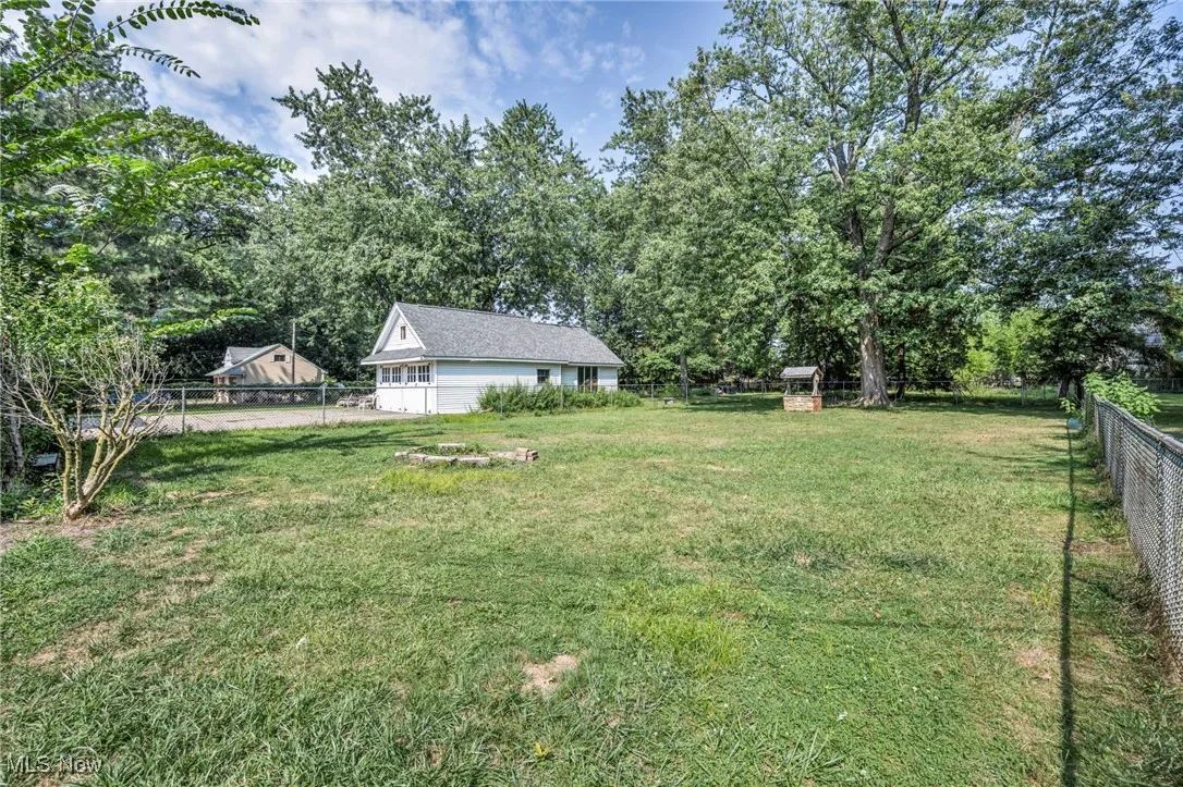 View of yard with view of scattered trees