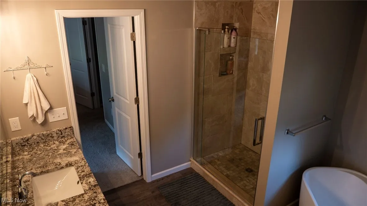 All new shower(1year) granite counter tops and  modern single tub.
