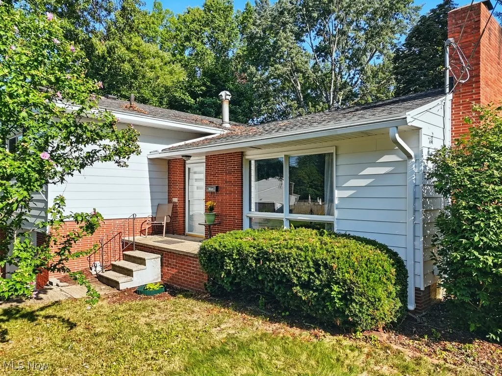 View of front of house with a front yard