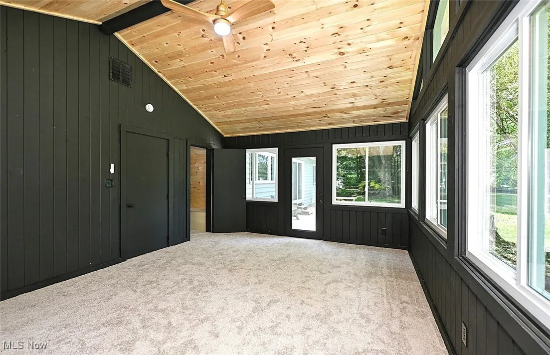 *LARGE MASTER BEDROOM RETREAT SITS ON IT'S OWN SIDE OF HOME WITH NEW SOFT CARPET, BEAMED VAULTED CEILING, CEILING FAN W/REMOTE AND LIGHT, KNOTTY PINE CEILING, HEATED AND COOLED. ADD YOUR OWN SHADES TO THE WINDOWS LIKE ANY BEDROOM FOR PRIVACY AND DARKNESS. SUPER COOL TO HAVE A BEDROOM LIKE THIS ~