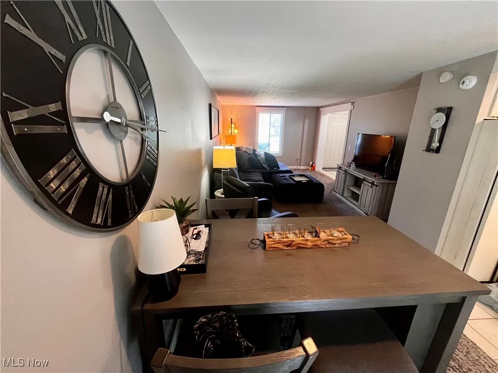 Dining area with carpet flooring