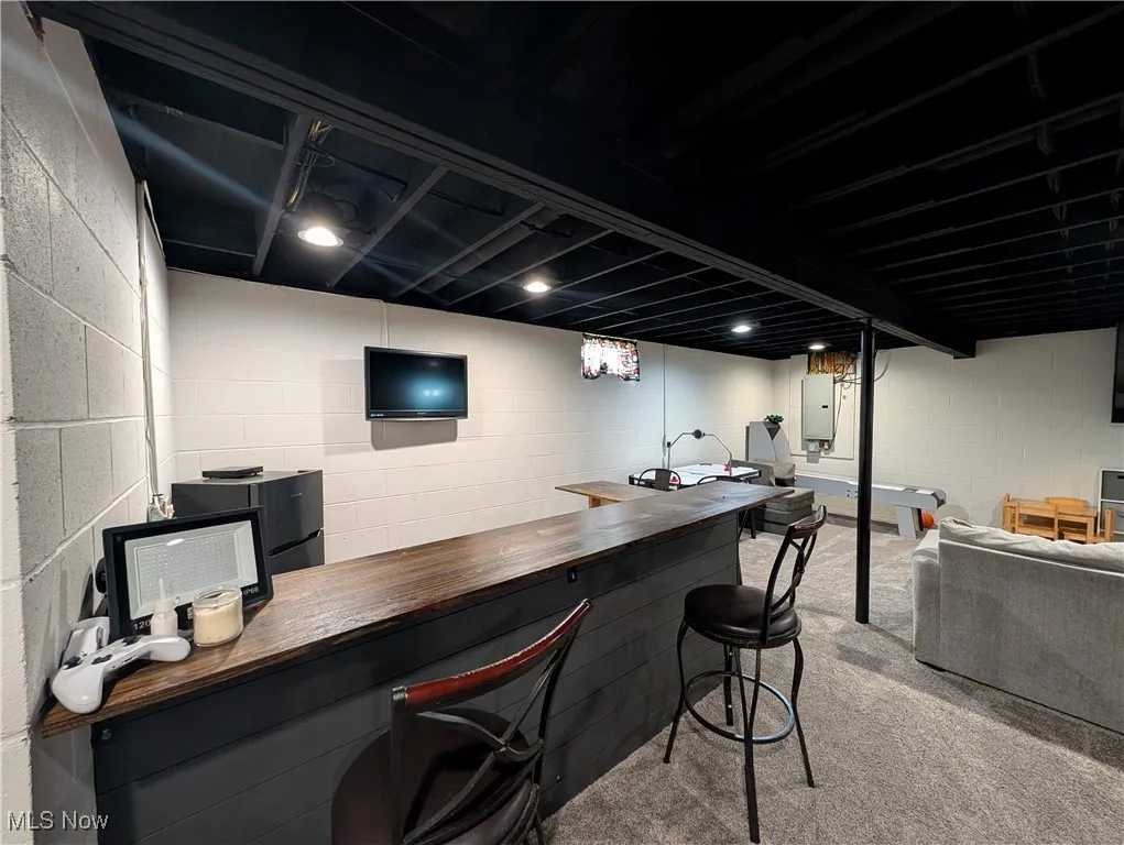 Indoor dry bar with electric panel