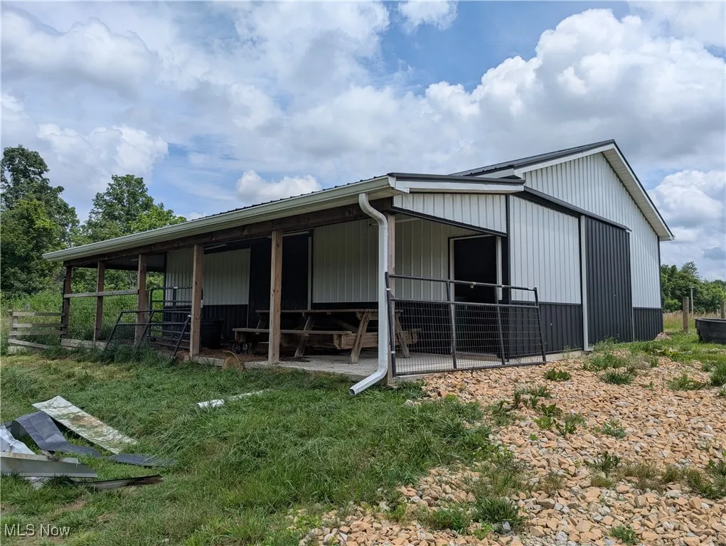 View of outbuilding featuring an exterior structure
