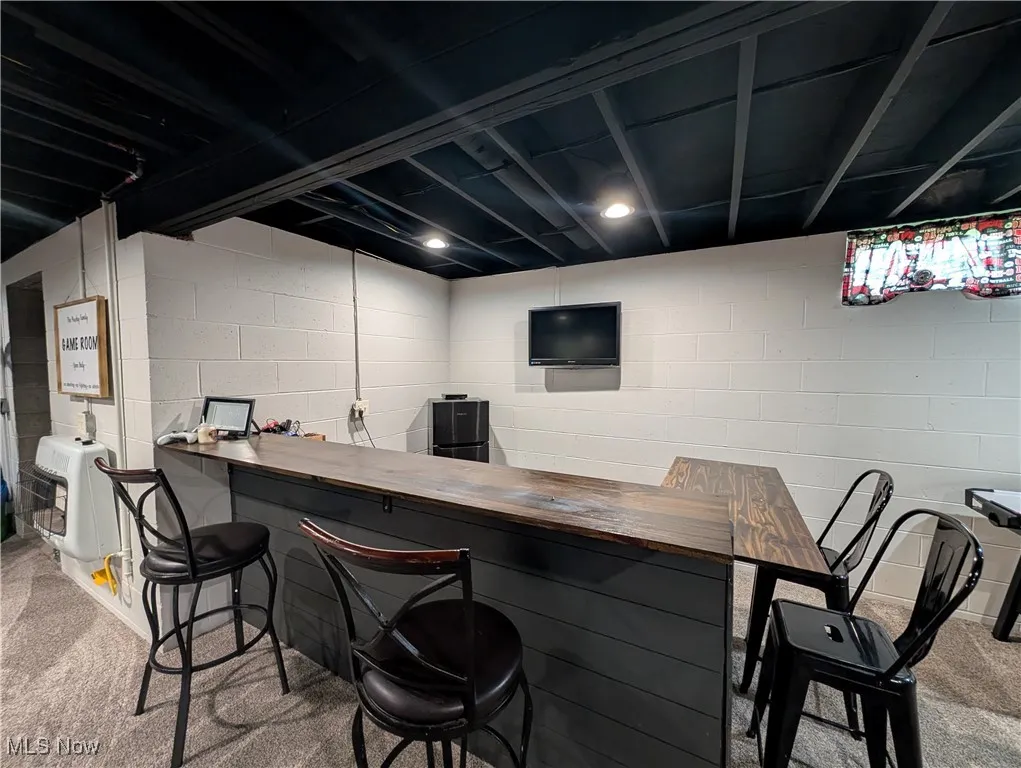 Bar area featuring carpet