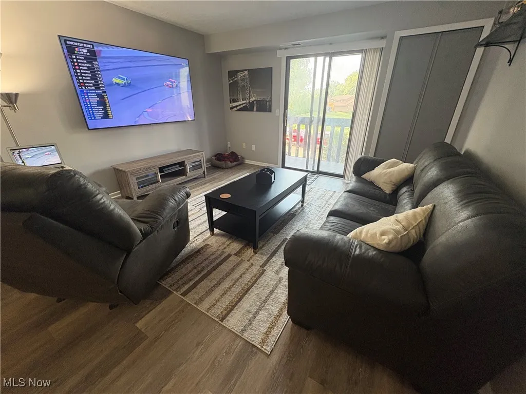Living room featuring wood finished floors