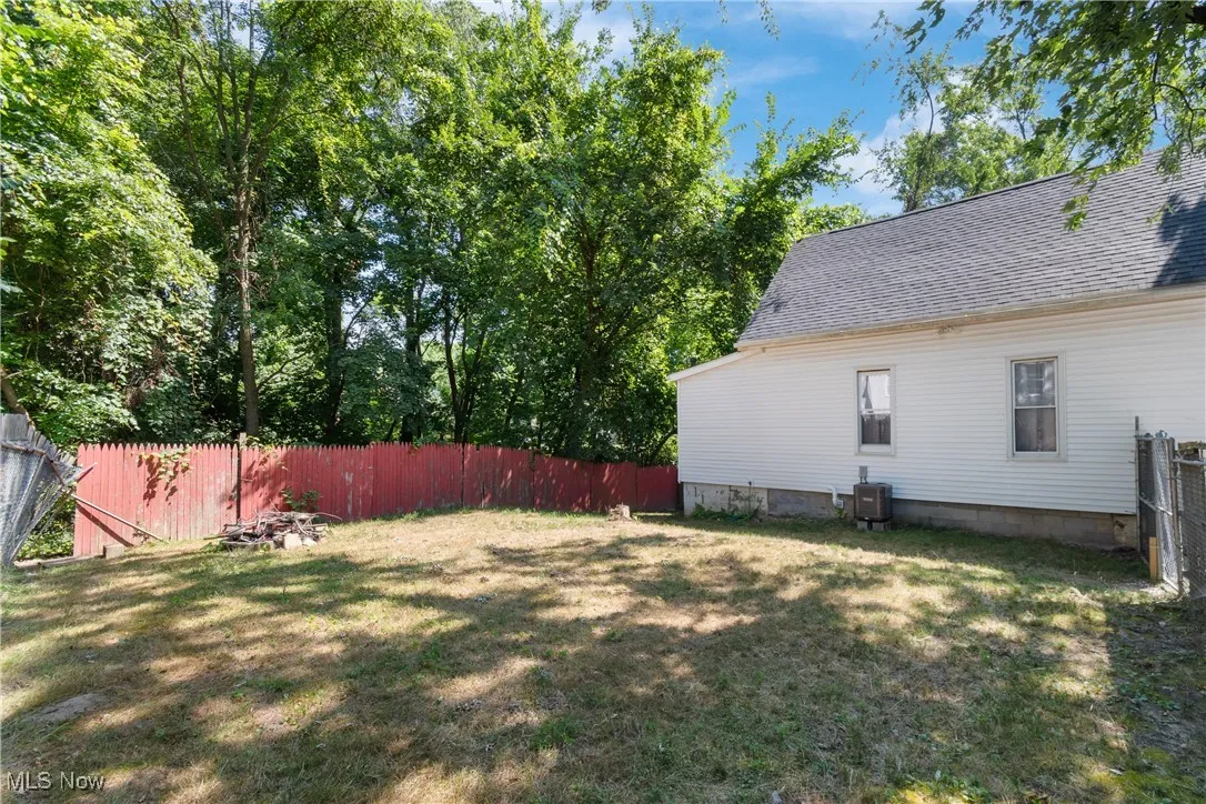 View of fenced backyard