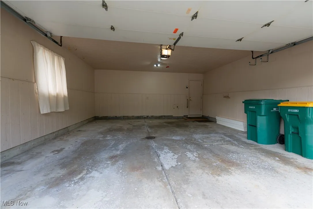 The 2 car garage has electric and cold water