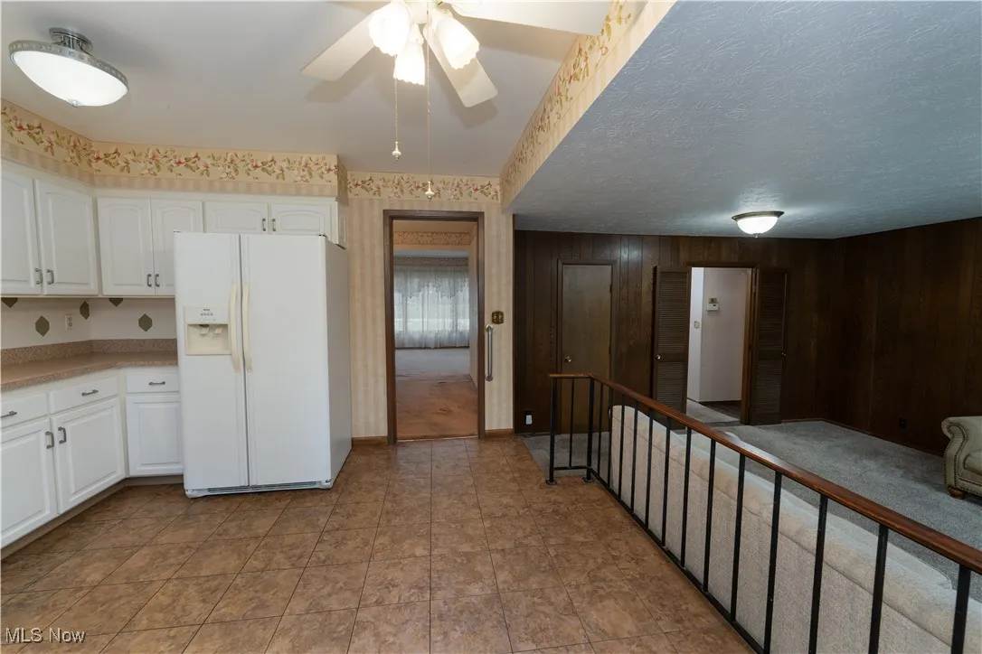 Kitchen layout view showing pocket door leading to dining room and the other door leads to the main hallway