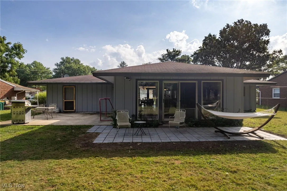 Rear view of property with two patio areas, pavers done 2025