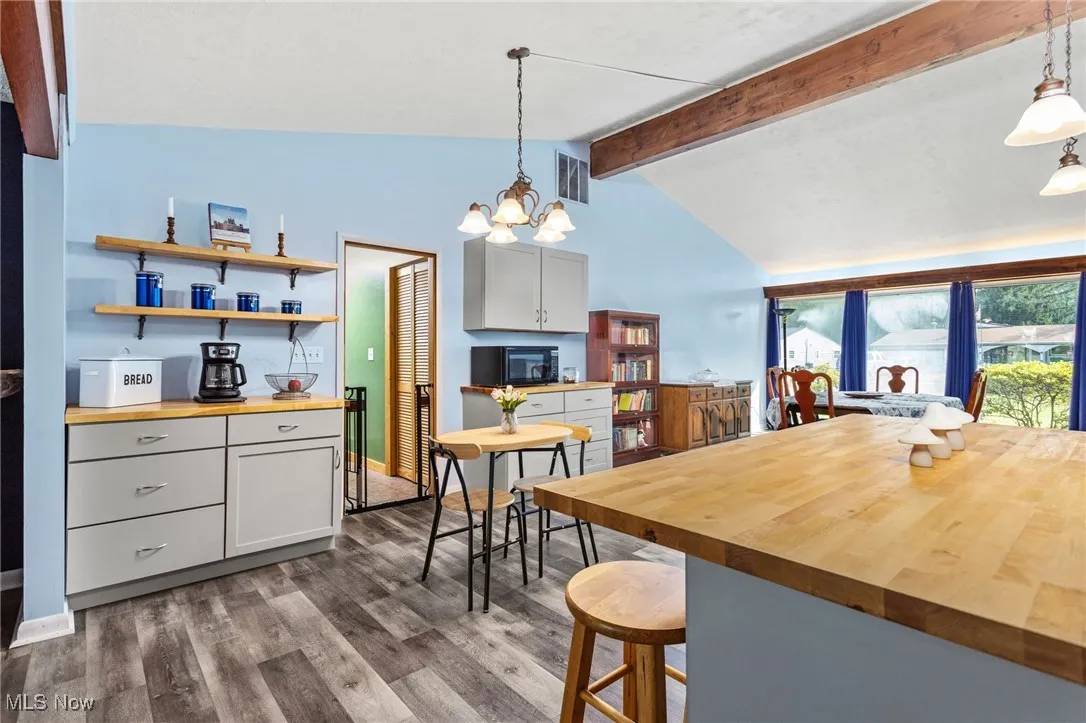 Updated Kitchen, beamed ceiling, laminate flooring