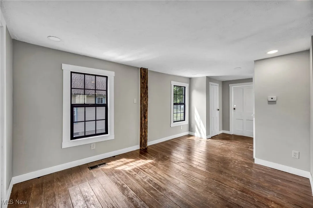 Unfurnished room with recessed lighting and hardwood / wood-style floors