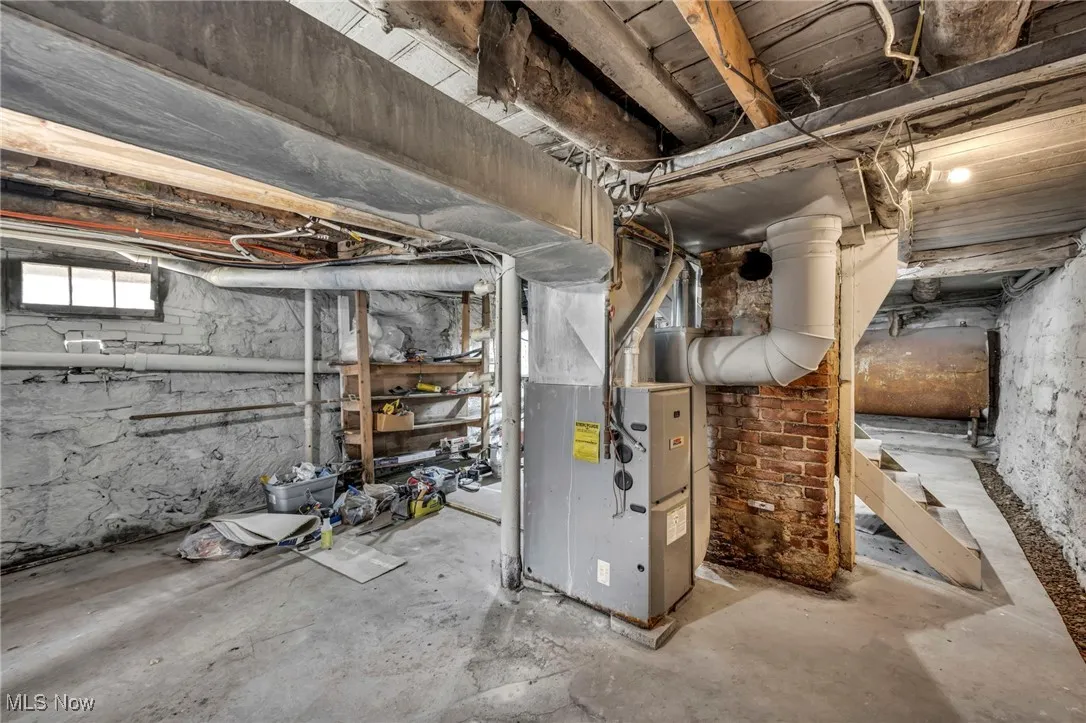 Basement with oil tank and heating unit