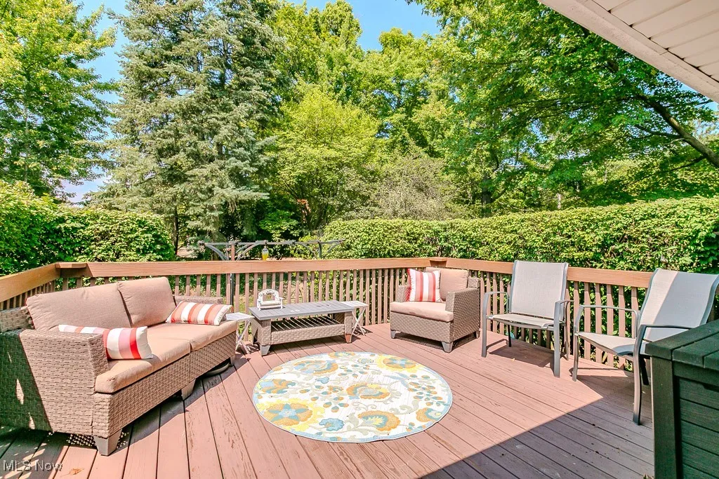 Wooden terrace with an outdoor hangout area