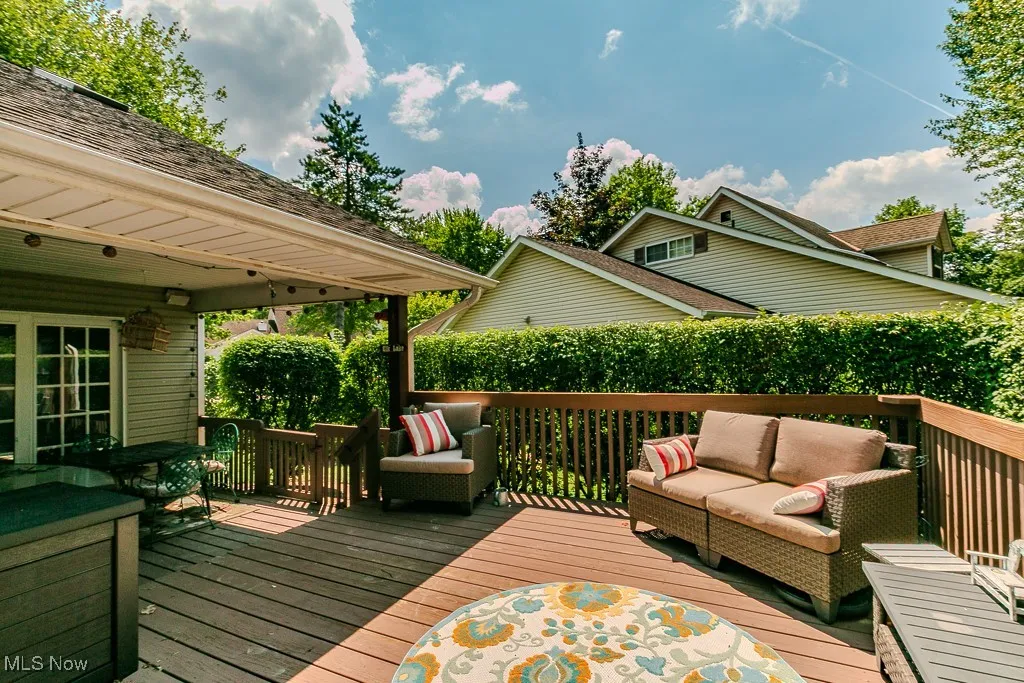 Wooden deck featuring an outdoor hangout area