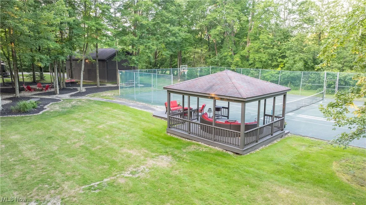 View of yard with tennis court featuring deck#3  

#3 with gazebo