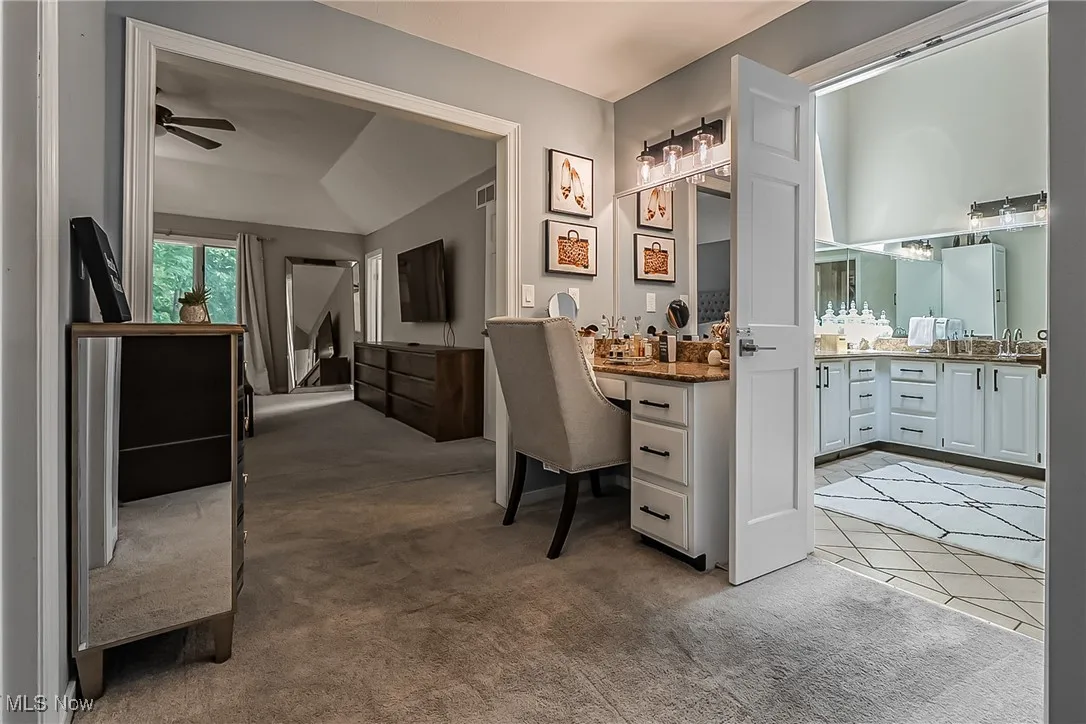 Dressing area has a vanity, 2 walk in closets and access to in-suite sauna