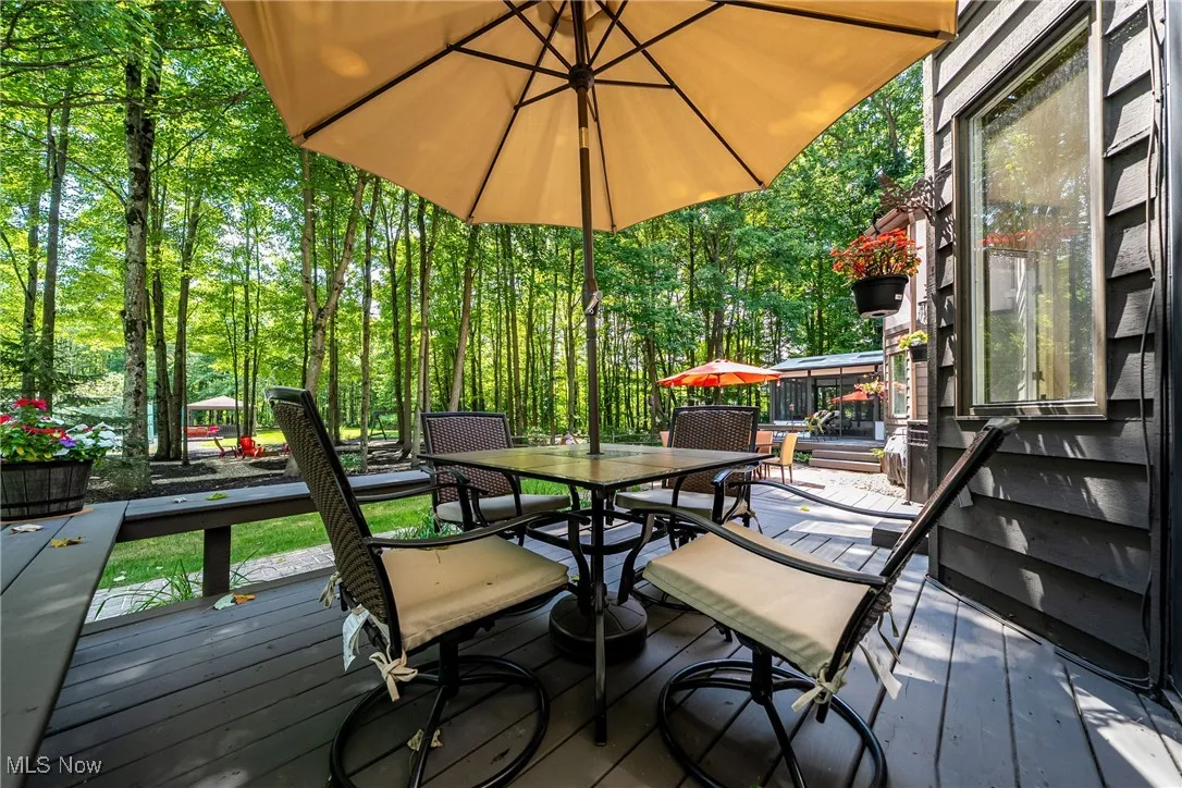 Wooden deck #1 featuring outdoor dining space, built in bench, perfect for outdoor dining.