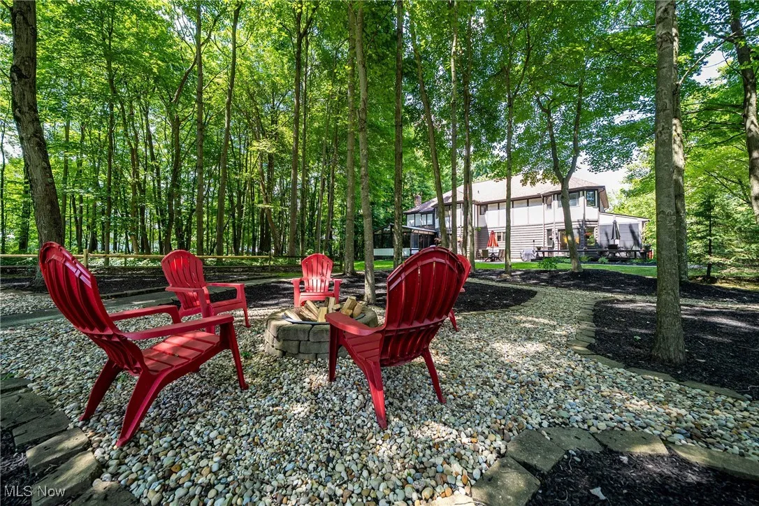 View of yard featuring an outdoor fire pit