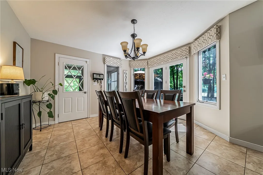 Breakfast room has access to deck #1 and screened side porch.