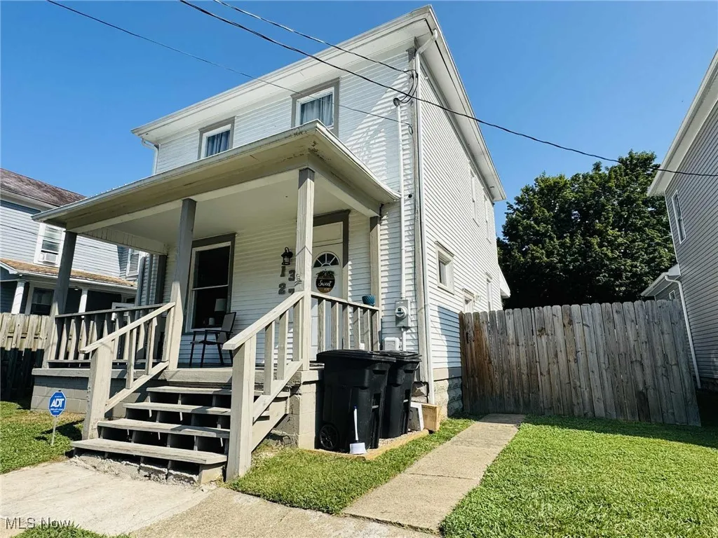 View of front of house featuring covered porch