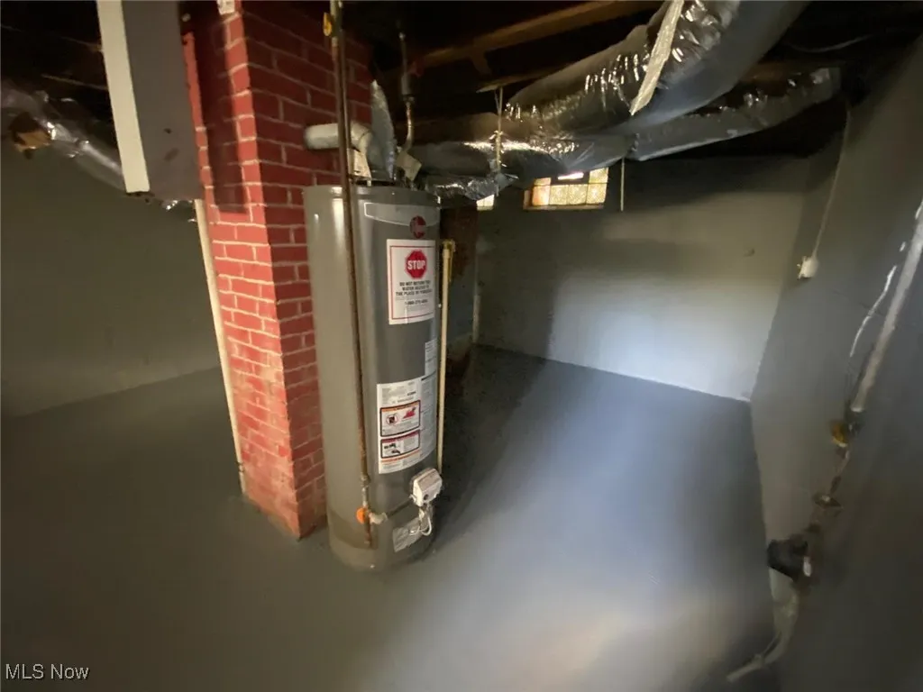 Utility room with gas water heater