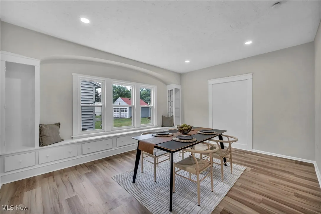 Dining room featuring recessed lighting and light wood-style flooring