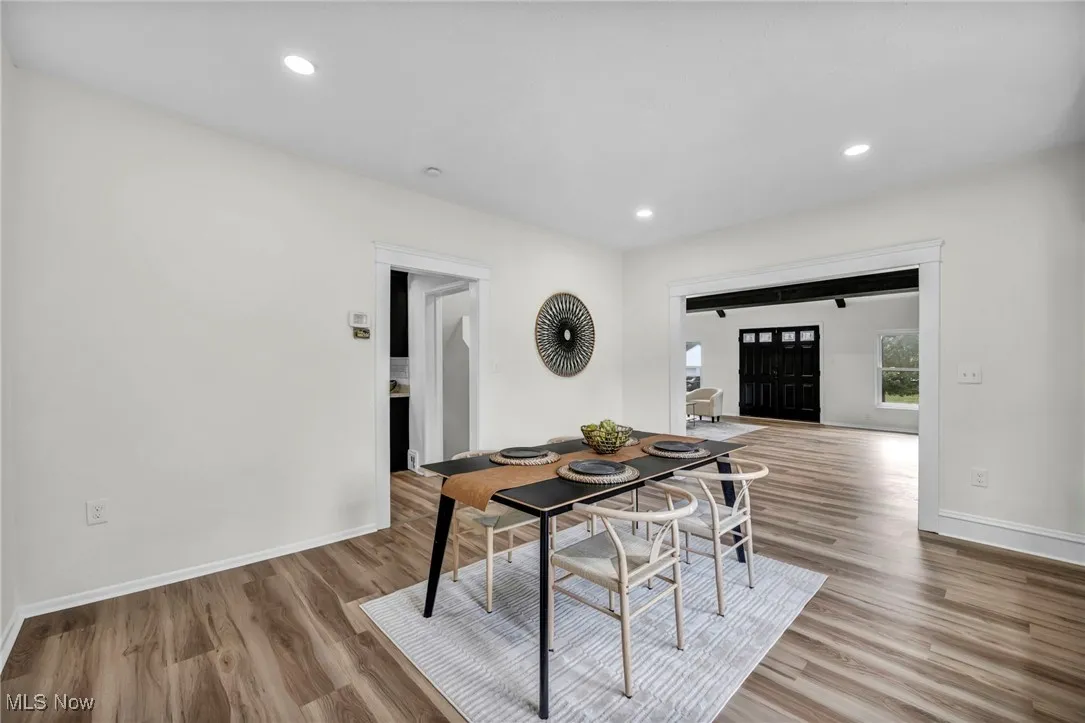Dining room featuring recessed lighting and light wood-style flooring