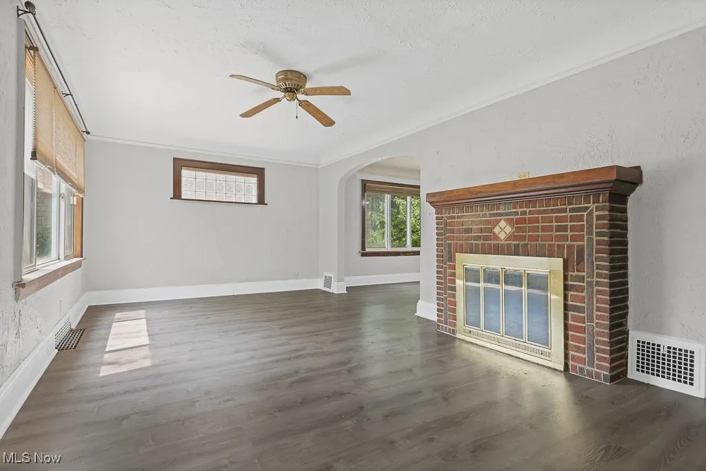 Living room with decorative fireplace