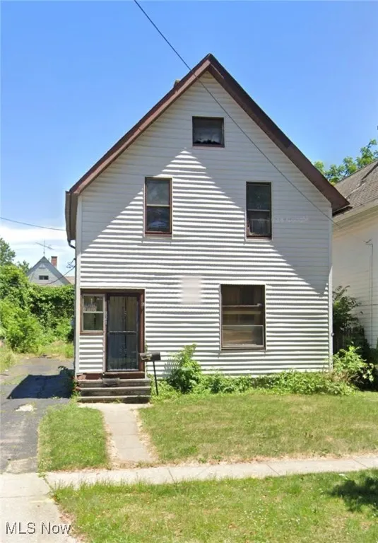 Back of house with entry steps