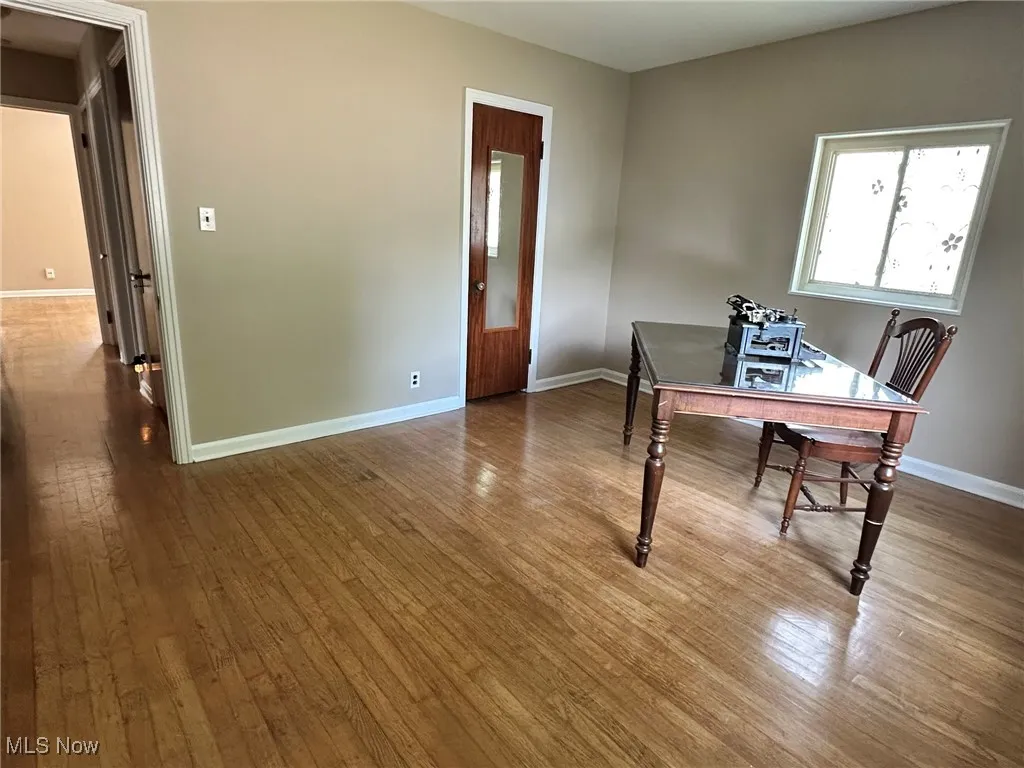 Office space with light wood finished floors