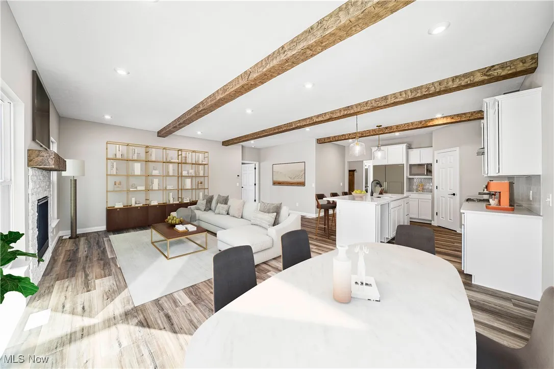 Open floor plan. Subject property DOES include beams!