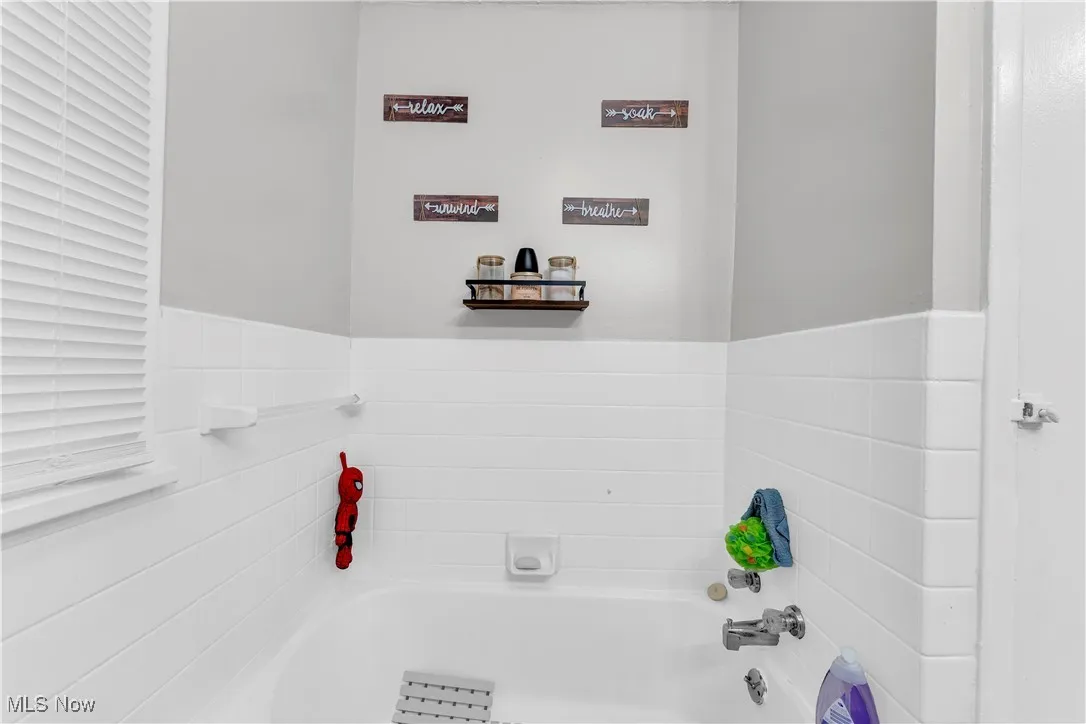 Bathroom featuring a bath