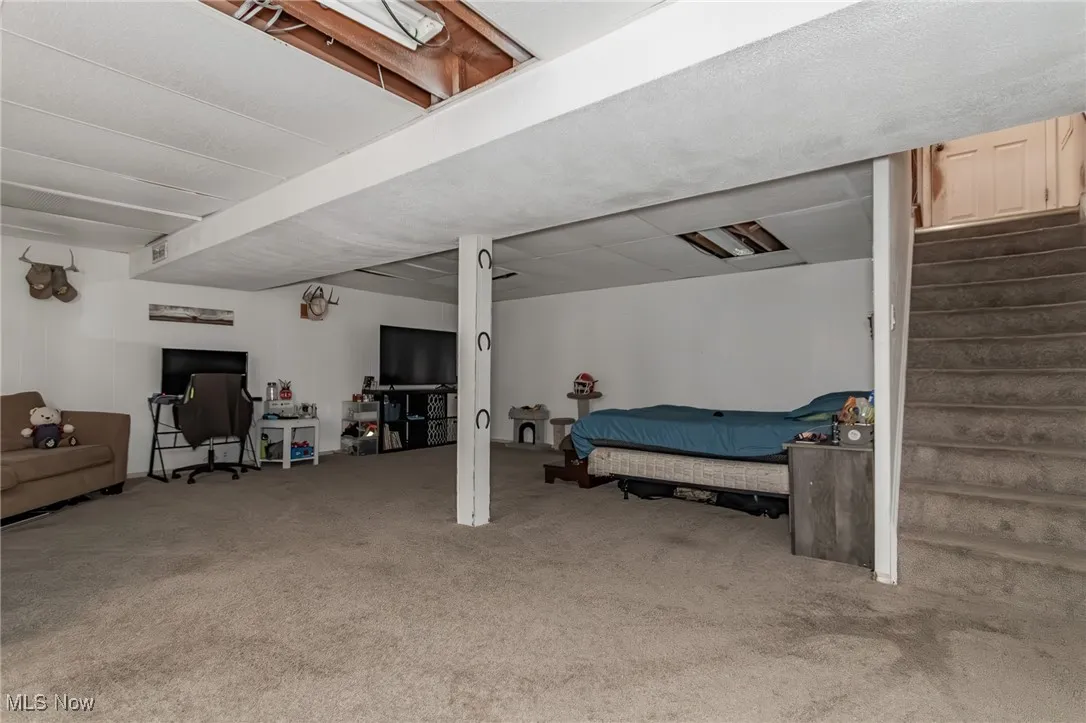 Bedroom featuring carpet floors