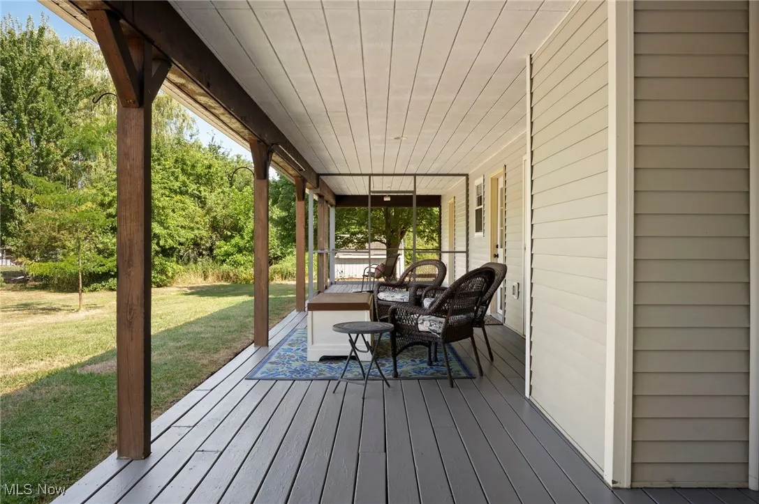 Covered back porch, with a portion screened in