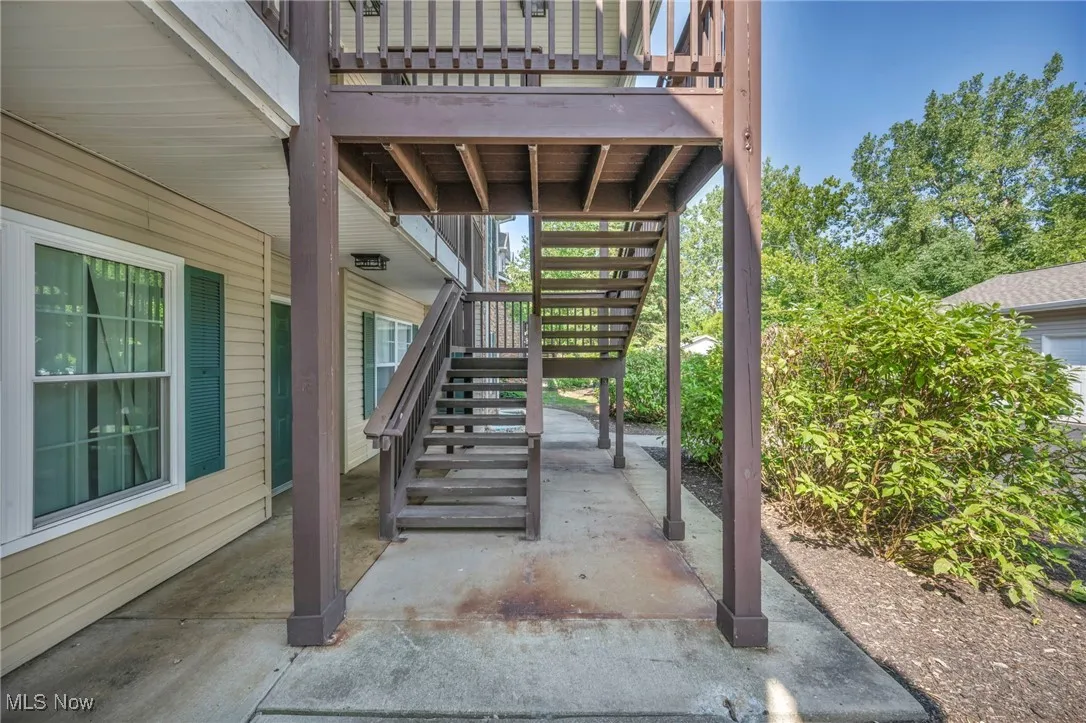 View of patio / terrace featuring stairway and a wooden deck