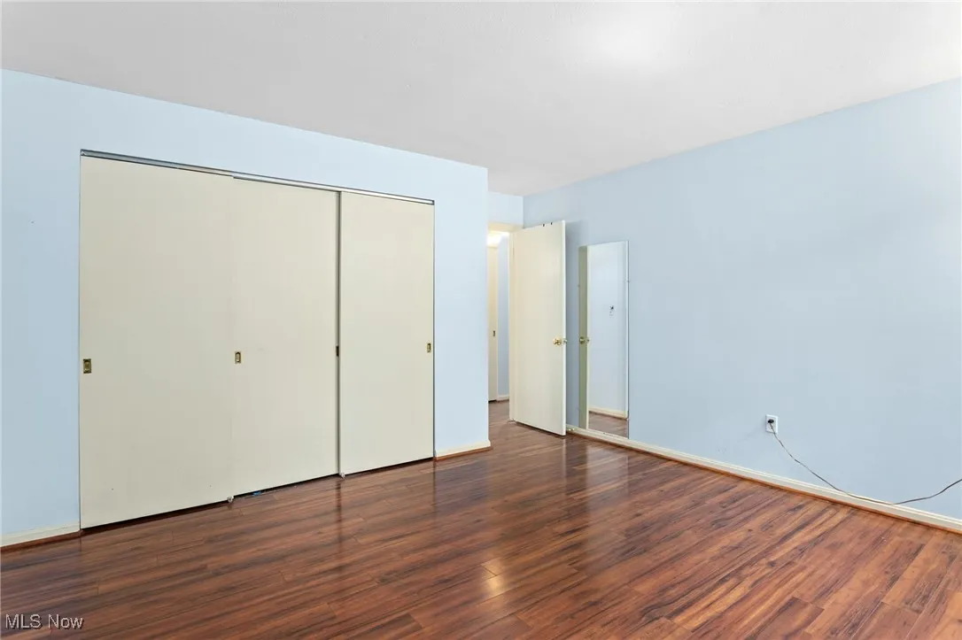 bedroom with laminate floors