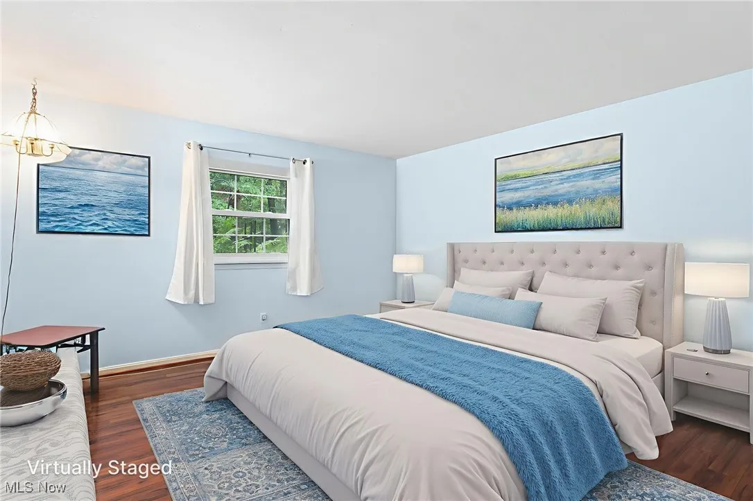 virtually staged Bedroom with laminate floors