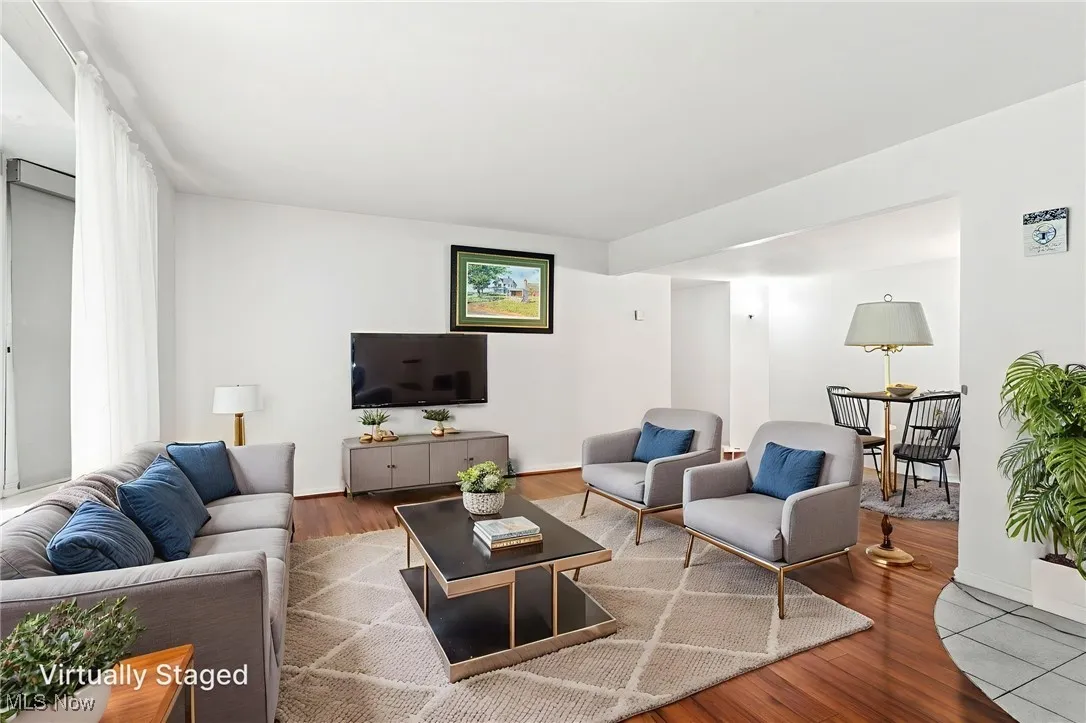 Virtually staged Living room with laminate flooring