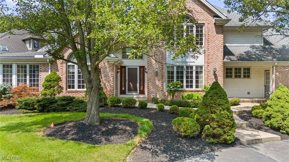 View of front of home with brick siding