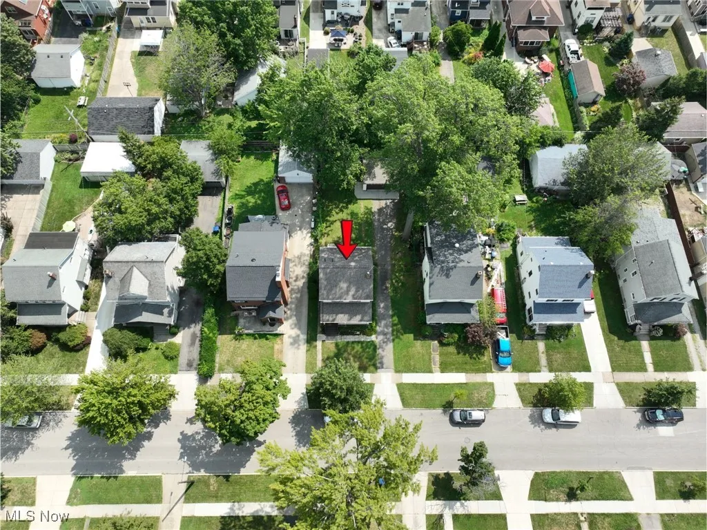 Aerial overview of property's location with nearby suburban area