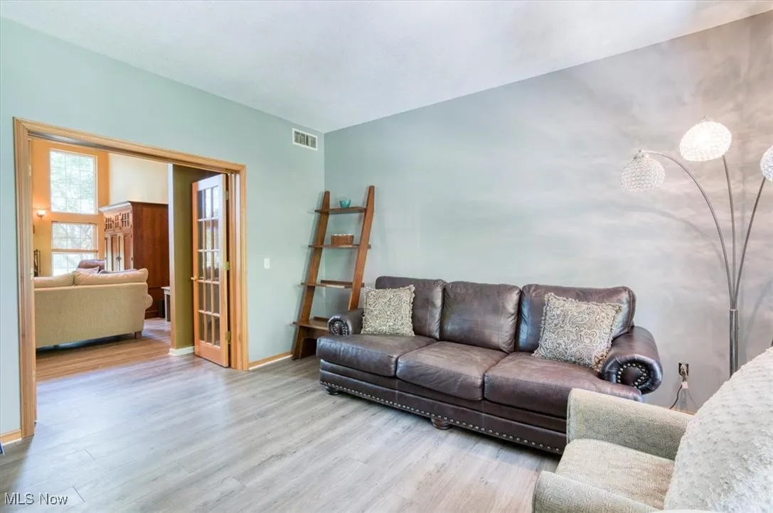 Living area featuring wood finished floors and baseboards