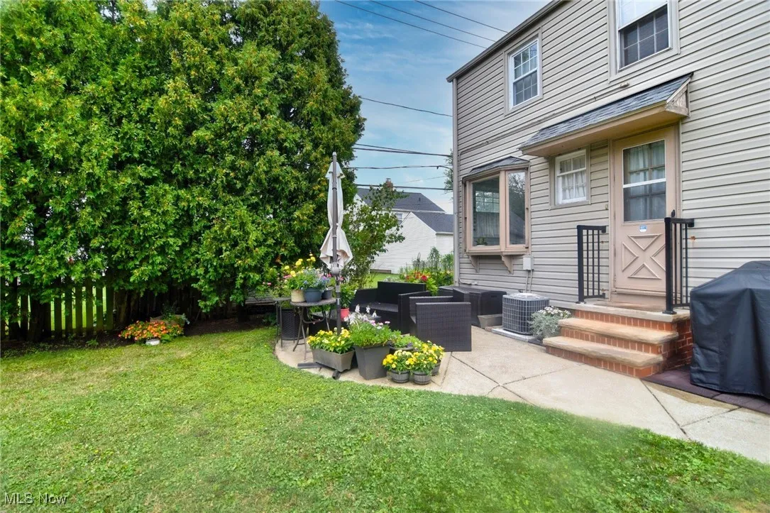 View of yard featuring a patio area and outdoor lounge area
