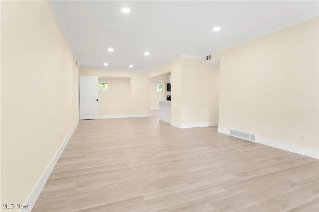Spare room with recessed lighting and light wood-style floors