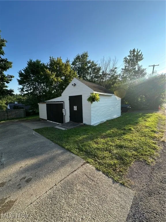 Garage View w/ attached shed and extra storage