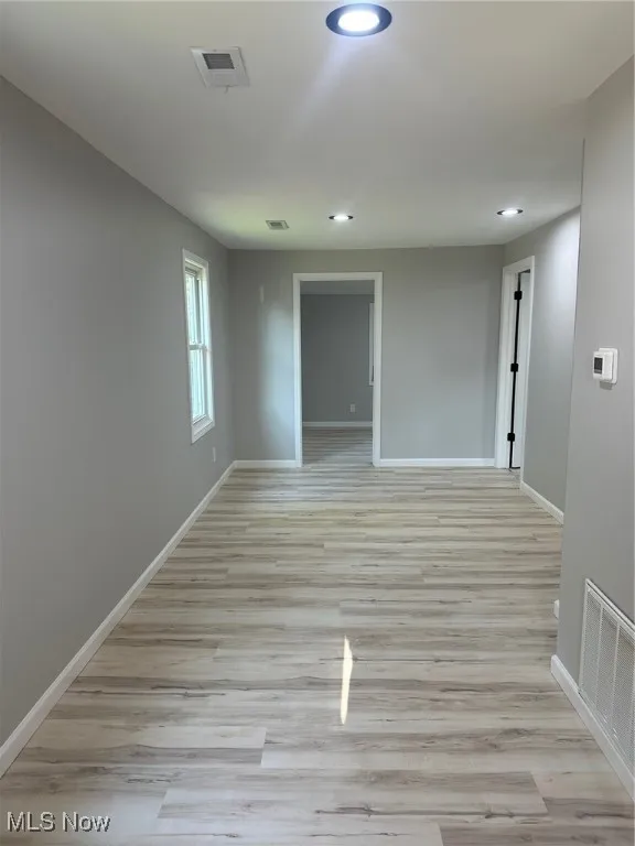 Second living room view 2 w/ recessed lighting