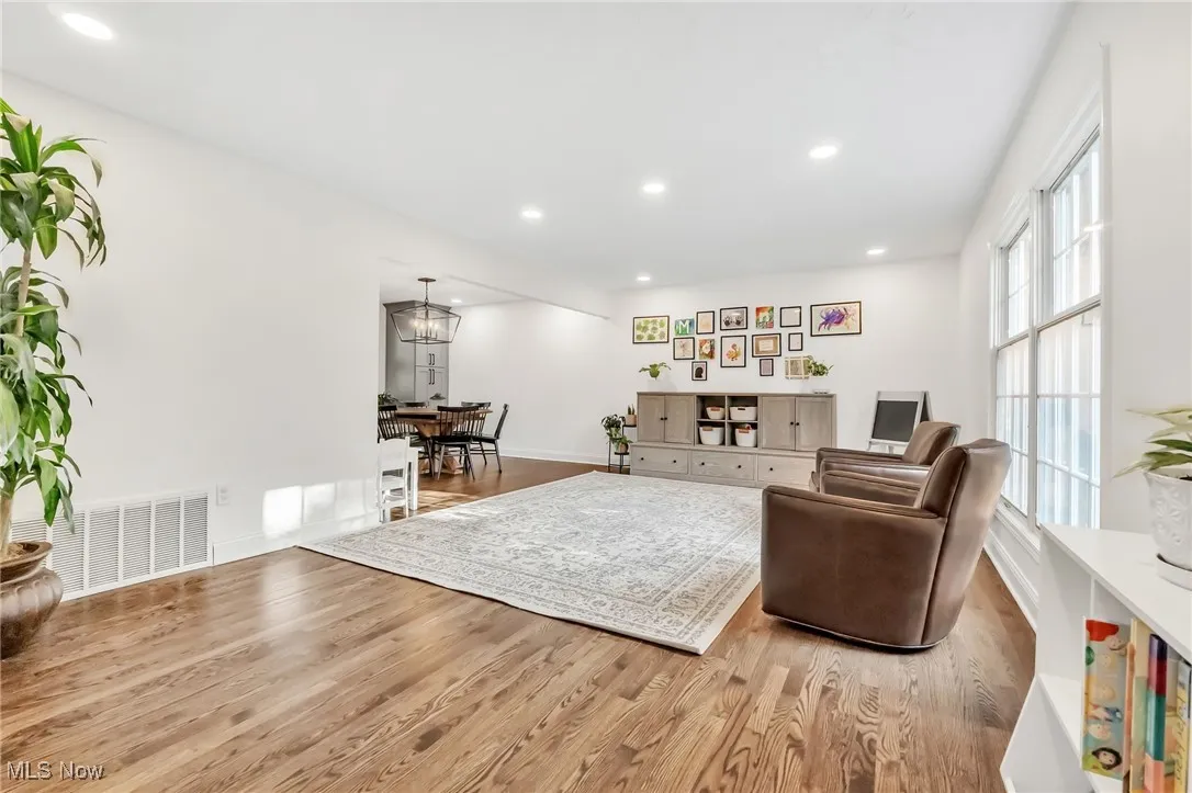 Living room featuring recessed lighting and light wood-style floors