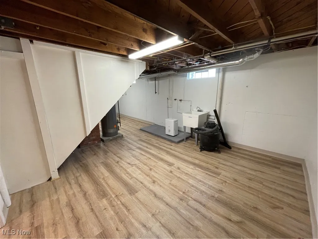 Below grade area featuring light wood-style floors