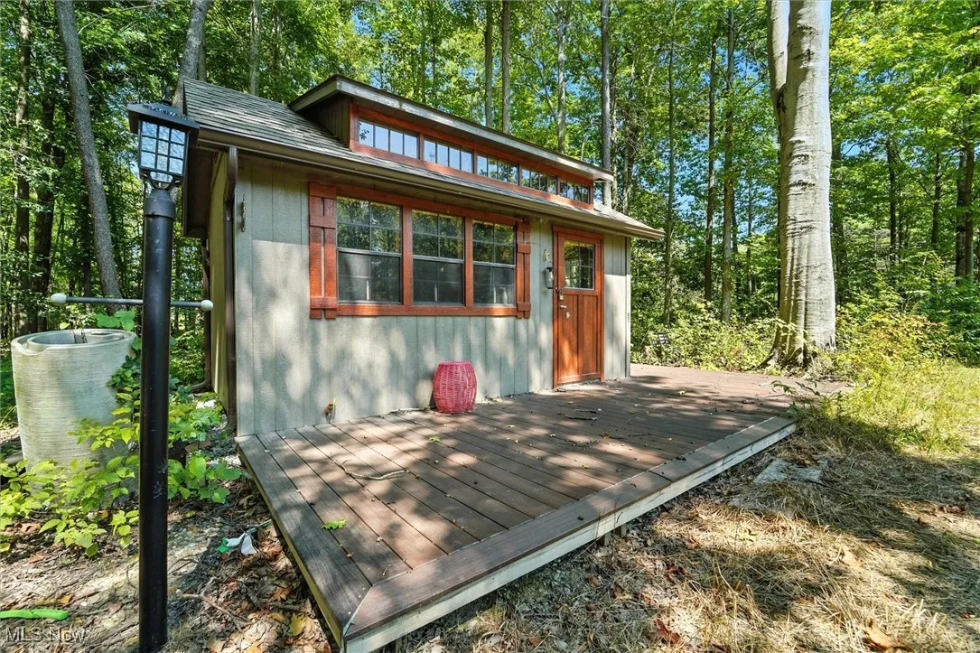 View of the 18x12 Fishing Cabin w/ wrap around Trex deck