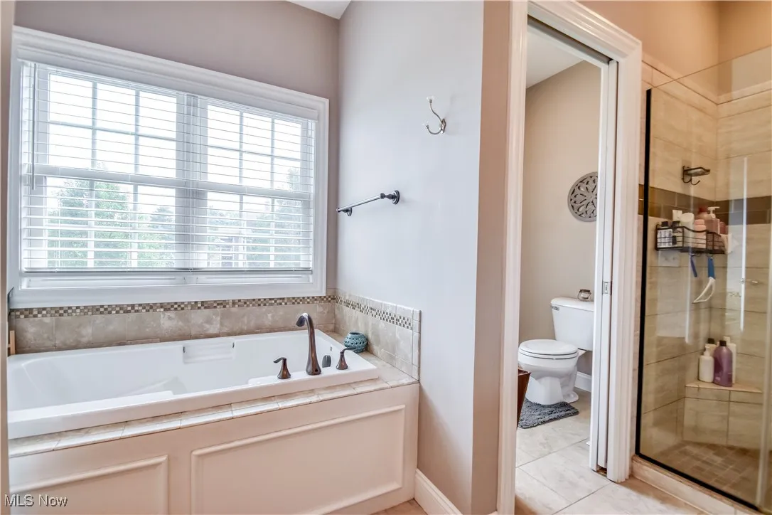Primary Bathroom with private toilet space