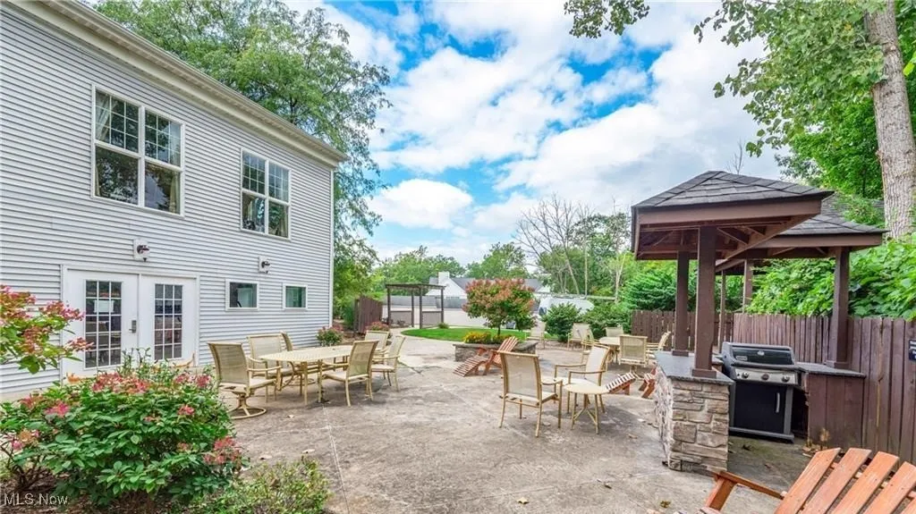Clubhouse patio with BBQ grill and outdoor seating